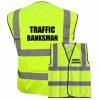 yellow hi vis traffic banksman